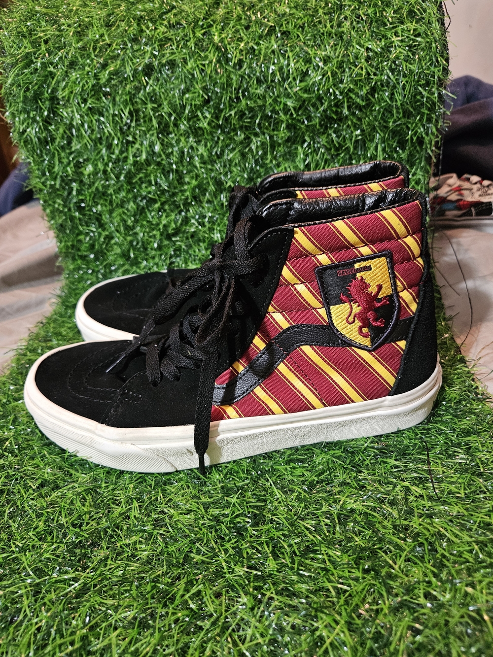 Vans High-Top Sneakers in Black, Red and Gold Stripe